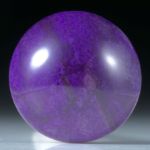 Sugilith Südafrika, 23x23x9.5mm 35.07ct. runder Cabochon