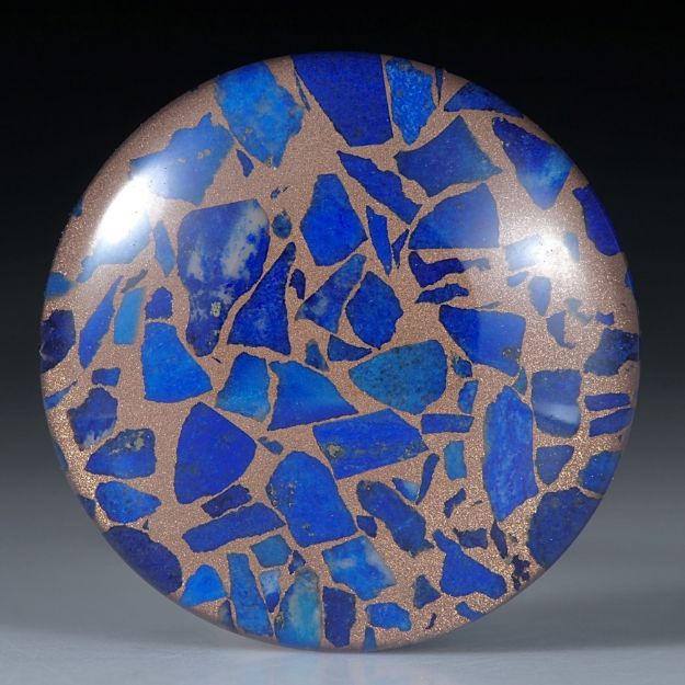 Lapislazuli in Bronzematrix, mit poliertem Bergkristall