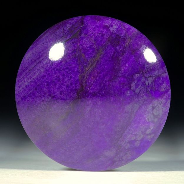 Sugilith Südafrika, ovaler Cabochon ca. 31x31x8mm