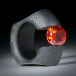 Karbon Spannring mit Zirkonia 12x10mm "Padparadscha", Breite 13.5mm, Innendurchmesser 18.6mm