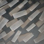 Rauchquarz Viereck in Torsion geschliffen (gebogen), mit sandgestrahltem Muster ca.39x39x3mm