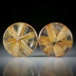 Sternrutil Paar, 21.39ct. runde Cabochon, beidseitig bombiert geschliffen und poliert, je ca.18x18x5mm