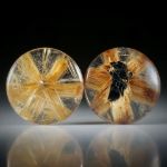 Sternrutil Paar, 21.39ct. runde Cabochon, beidseitig bombiert geschliffen und poliert, je ca.18x18x5mm