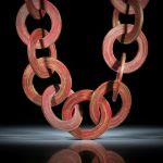 Glasfaser Scheibencollier Cadmiumrot/Bronce, Scheibendurchmesser 33mm, 25 Stk. Länge ca.46cm