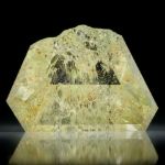 Goldberyll Spiegelschliff, 49.09ct. teilweise naturbelassen ca.31x22x12mm