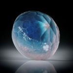 Turmalin mit Bergkristall doublettiert und unterlegt mit Perlmutter 34.86ct. runde Form facettiert ca.19.5x19.5x13.5mm