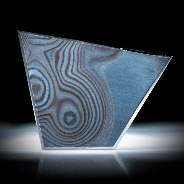 Psilomelan 34.81ct.  Trapezform flach geschliffen und poliert ca.43x31x2.3mm