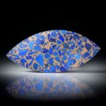 Lapislazuli in Bronzematrix 50.4ct.  Navette in Torsion geschliffen, matt/poliert ca.55x25x4mm