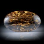 Bronzit 135.23ct.  langovaler Cabochon poliert, ca.55x32x9.5mm