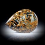Pietersit 52.83ct. Tropfenform poliert, ca.44x32x6mm