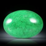 Maw-sit-sit, Chloromelanit, Myanmar,19.96ct. ovaler Cabochon ca.23.9x17x7.5mm