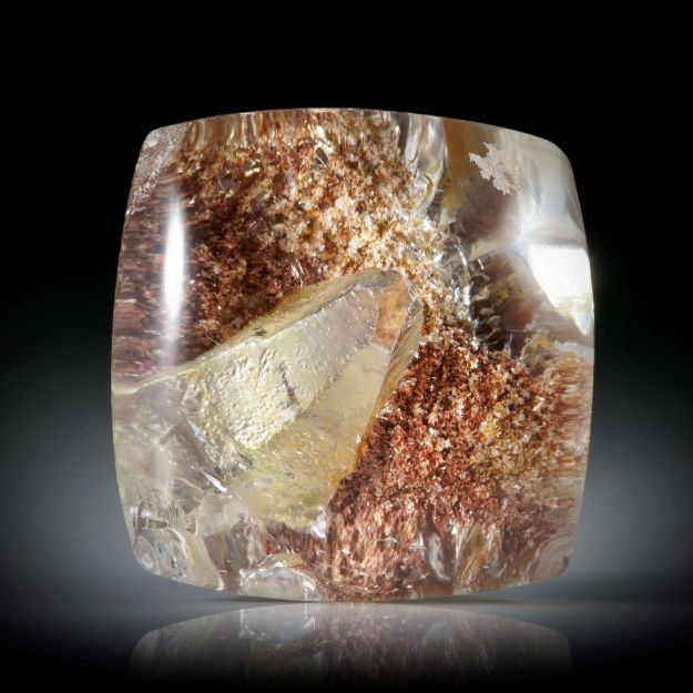 Quarz mit zentrischem Einschluss 6.97ct. Runder Cabochon ca.13.1x13x5.6mm