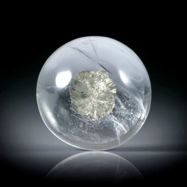 Quarz mit zentrischem Einschluss 6.97ct. Runder Cabochon ca.13.1x13x5.6mm