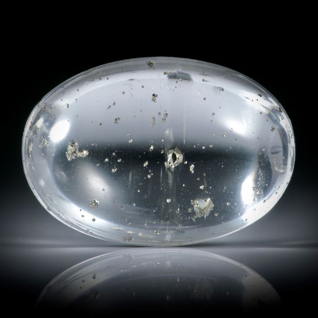Quarz Cabochon mit Pyrit Einschlüssen, ovale Form, 34.67ct. ca.26x18x11mm